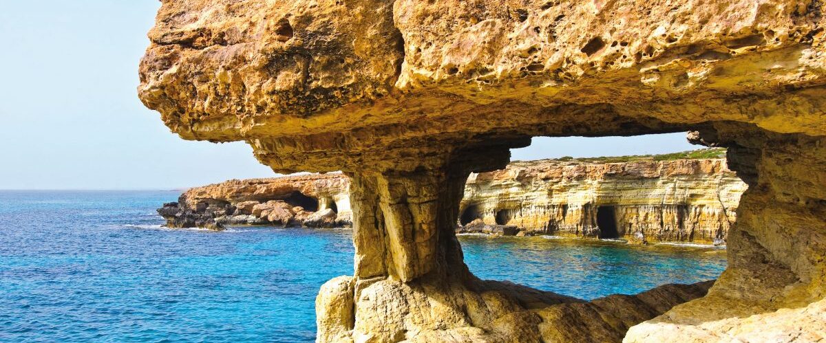 Sea caves near Cape Greko. Mediterranean Sea.