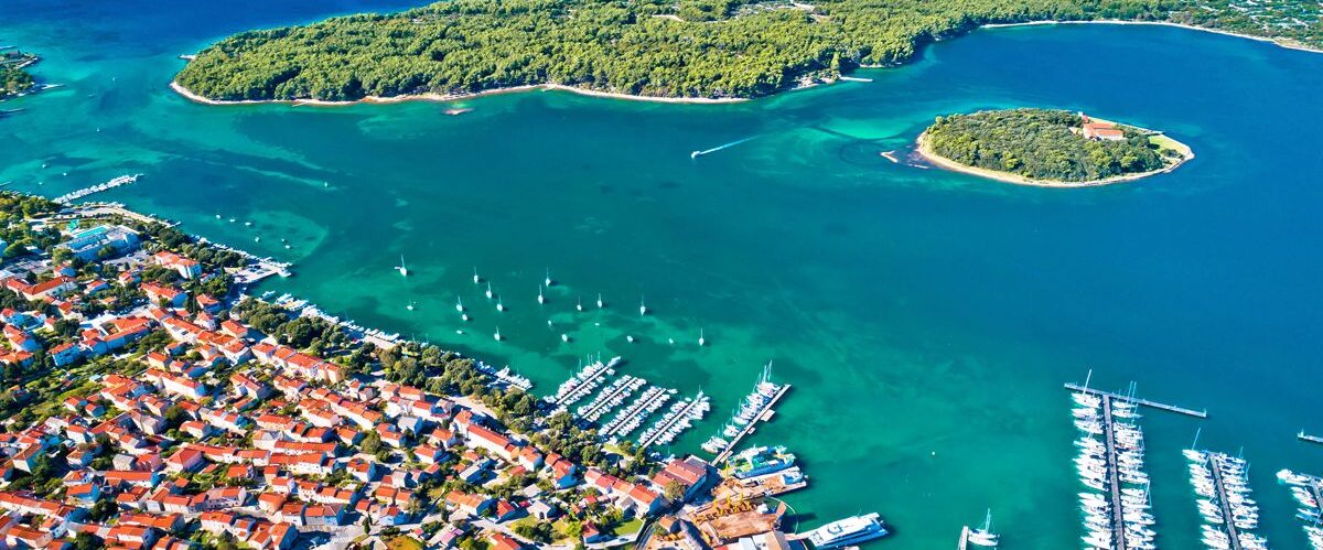 Punat. Town of Punat and monastery island of Kosljun aerial view