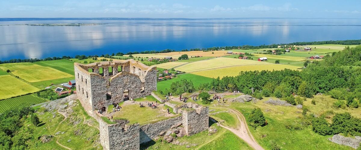 Brahehus,Castle,With,Lake,Background,-,Aerial,Summer,View